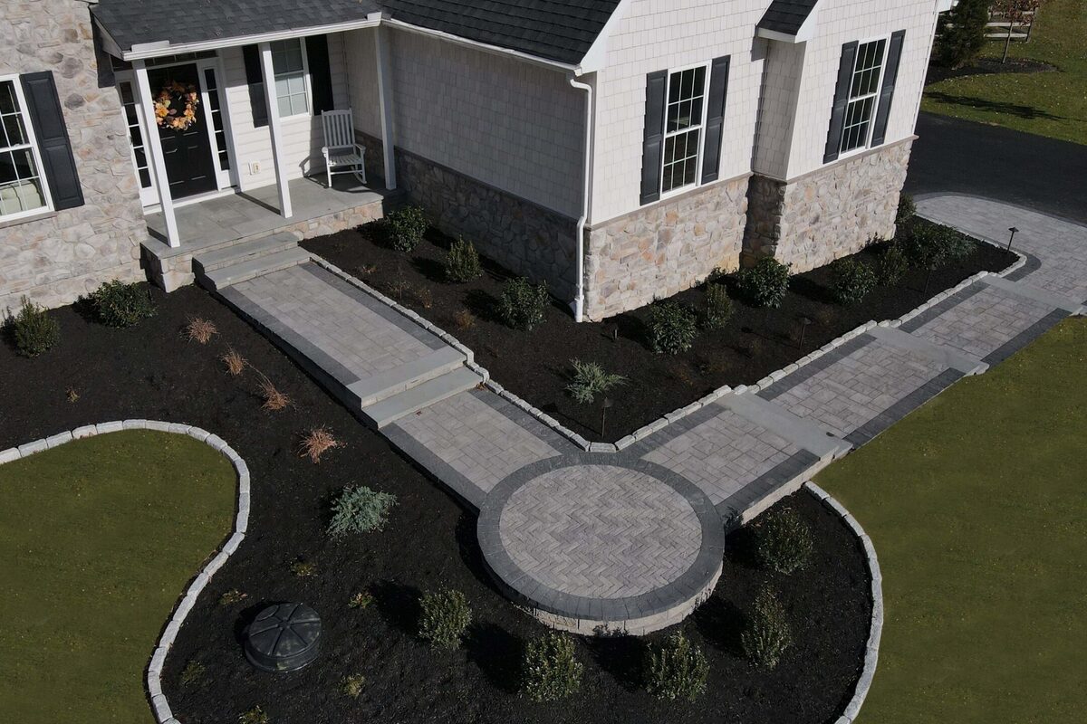 3D design rendering of a paver walkway with a circular inlay